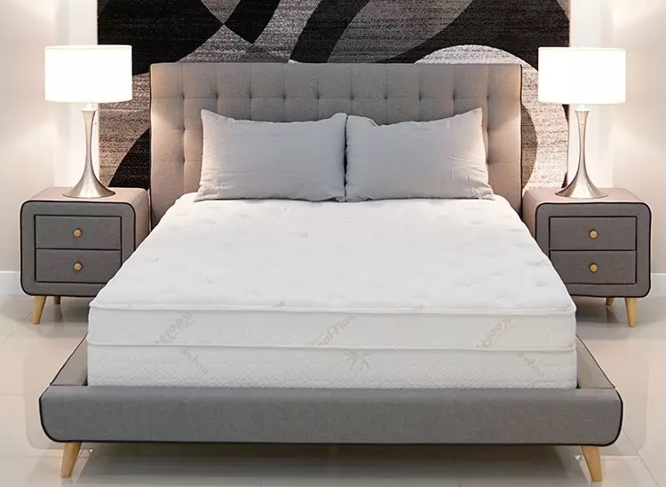 Couple on Hybrid Mattress at Bed Store